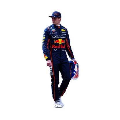 Person wearing a Red Bull racing suit and helmet on a white background