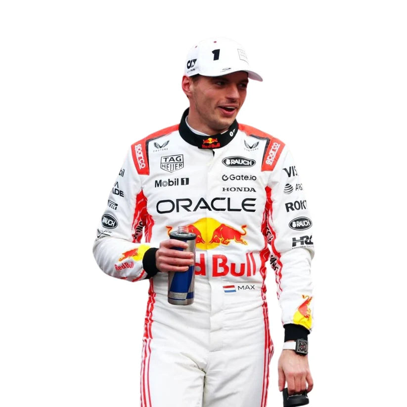 Person wearing a Red Bull racing suit holding a drink on a white background