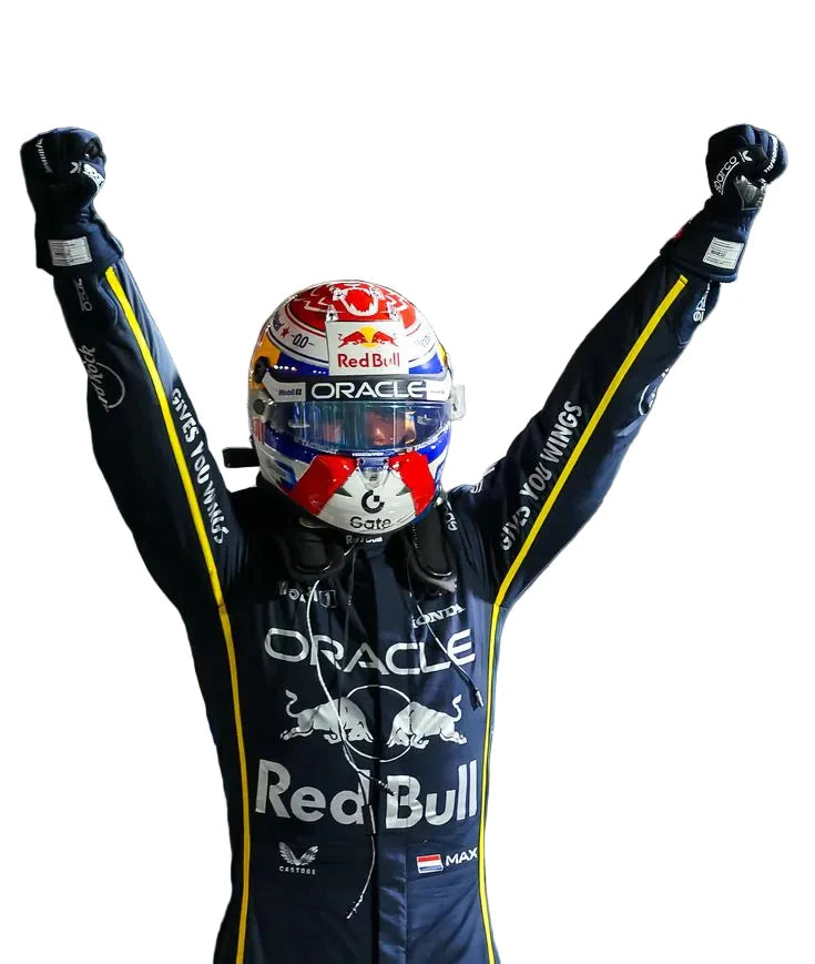 Person in a racing suit and helmet with Red Bull and Oracle branding, celebrating with arms raised.